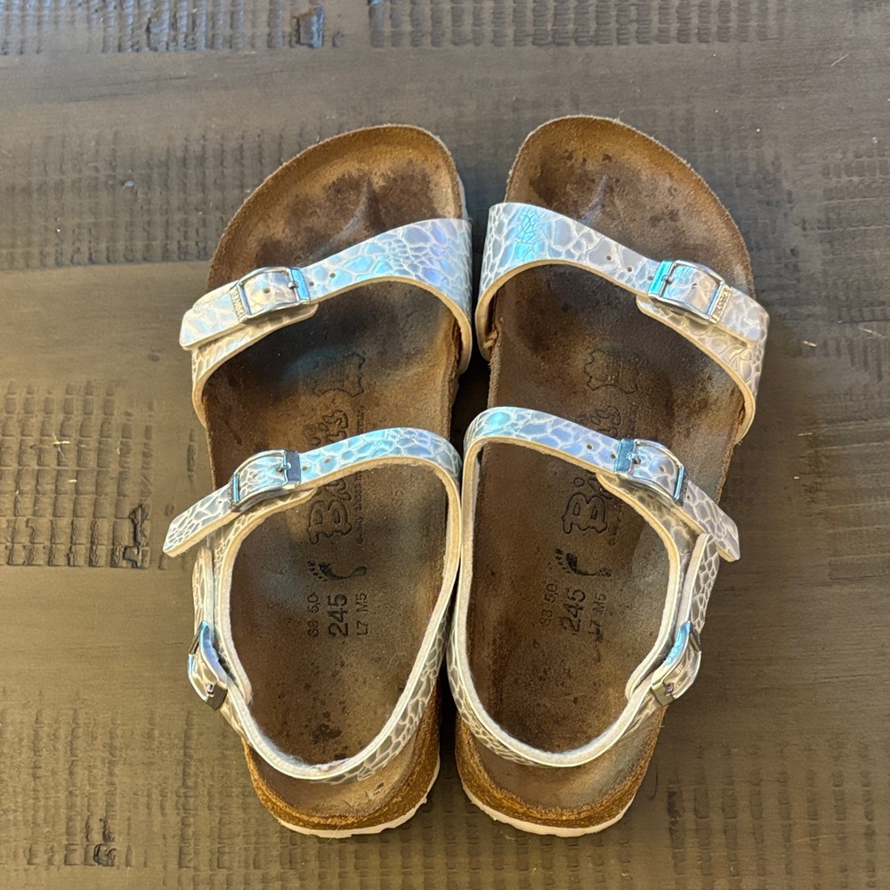 Birkenstock Birki’s Sandals in White and Silver
